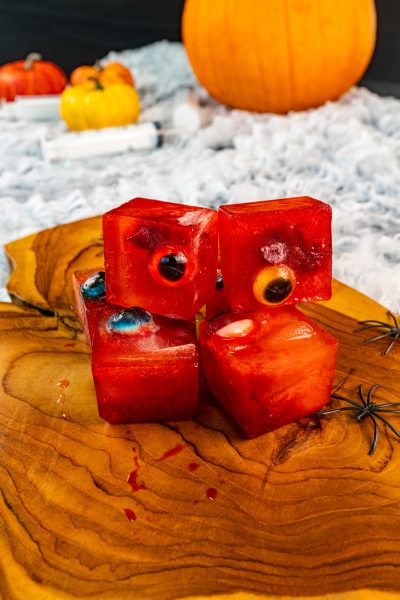 Halloween themed red ice cubes with candy eyballs frozen inside